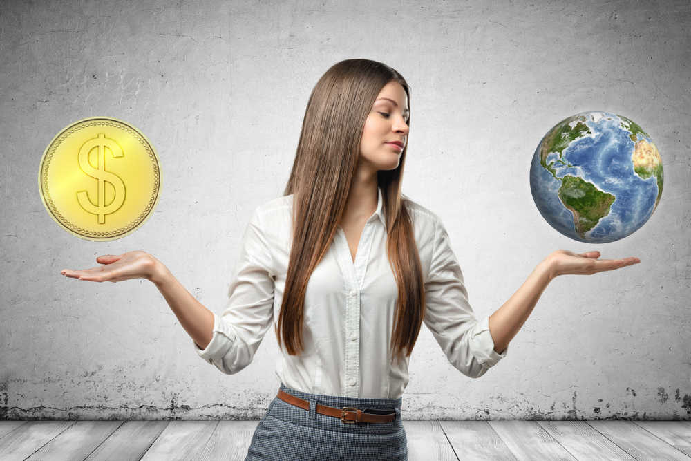 Balancing Profits Sustainability-Woman Holding Coin-Globe